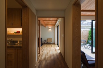  Living/dining and kitchen entrance from hall 